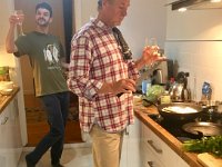 Time to start the birthday dinner. Stephen is head chef - Som Tam (green papaya salad), Mushroom Larb, and a green vegan curry.