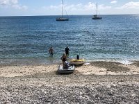 The guys boat in. Stephen swam to shore. But bare feet didn't go well as a previous cyclone dumped coral everywhere.