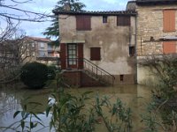 The garden side of the house is now a lake - you can see the water line.