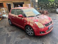 So the Swift waited outside whilst the garage was emptied and firehosed out.