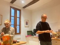 Preparing for the departure to Australia the duo fit in time to farewell guests. Here they prepare dinner for neighbours (Stephen prepares the Bœuf Bourgignon, Paulie the Clafoutis for dessert and the entree)